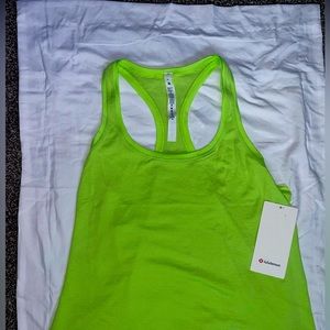 NWT Lululemon size 14 swiftly tech racer back tank. lime green sold out!